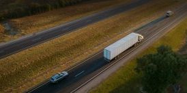 View from above of semi truck driving on highway